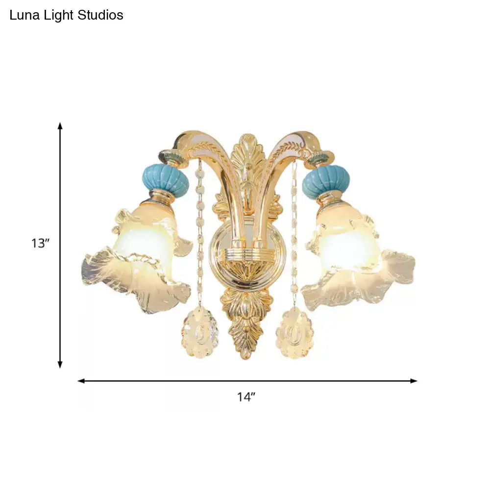 Ornate gold and blue glass wall mount light bedroom sconce