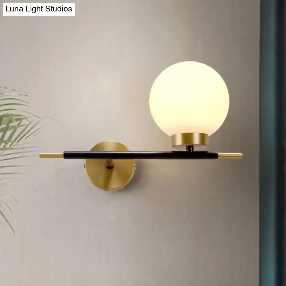 Post-modern white and brass sphere wall sconce bedroom light