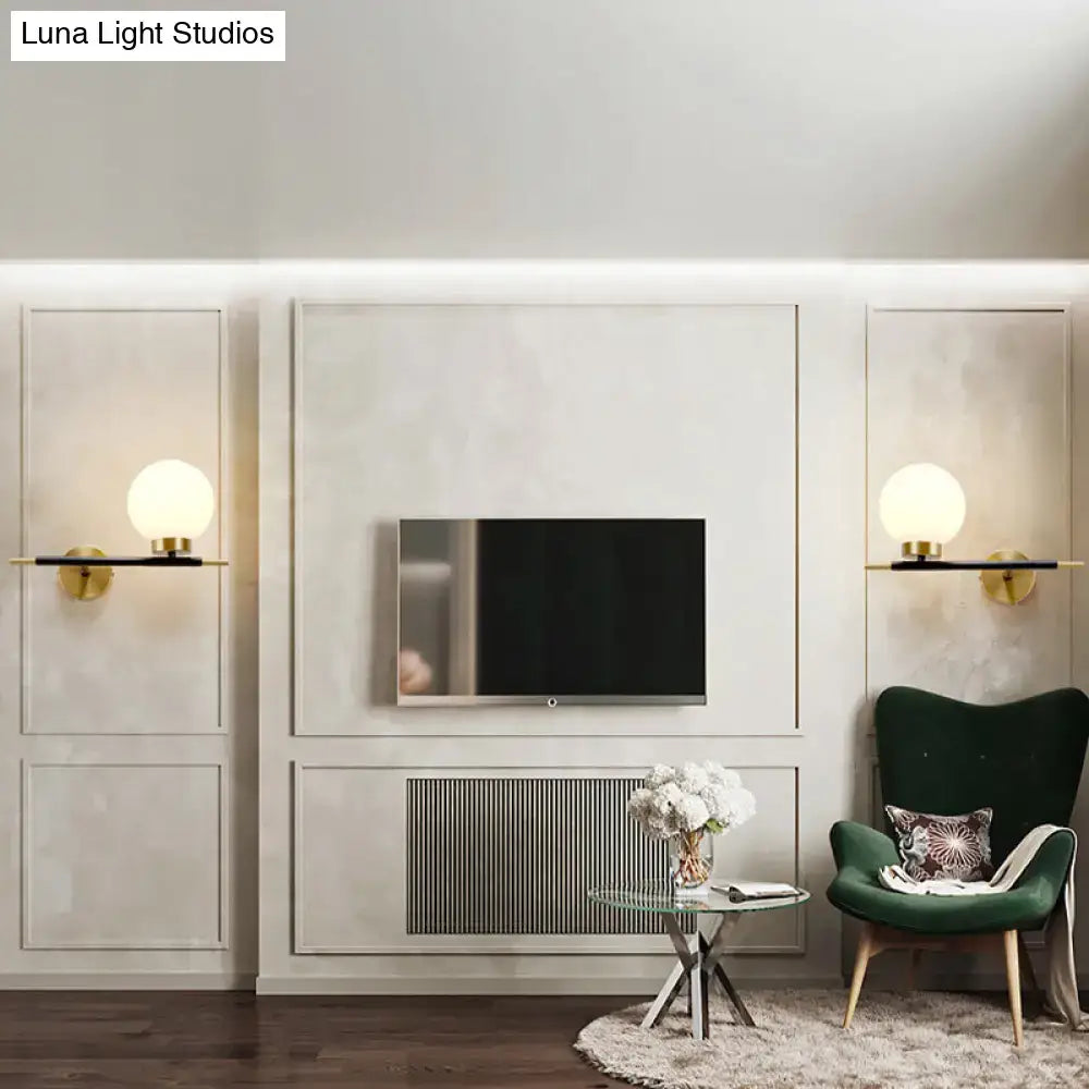 Post-modern white and brass sphere wall sconce bedroom light