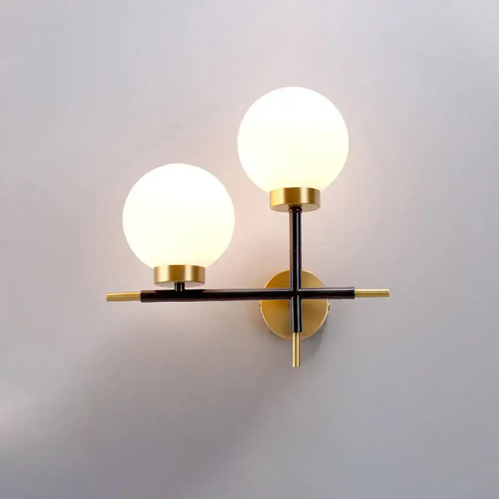 Post-modern white and brass sphere wall sconce bedroom light