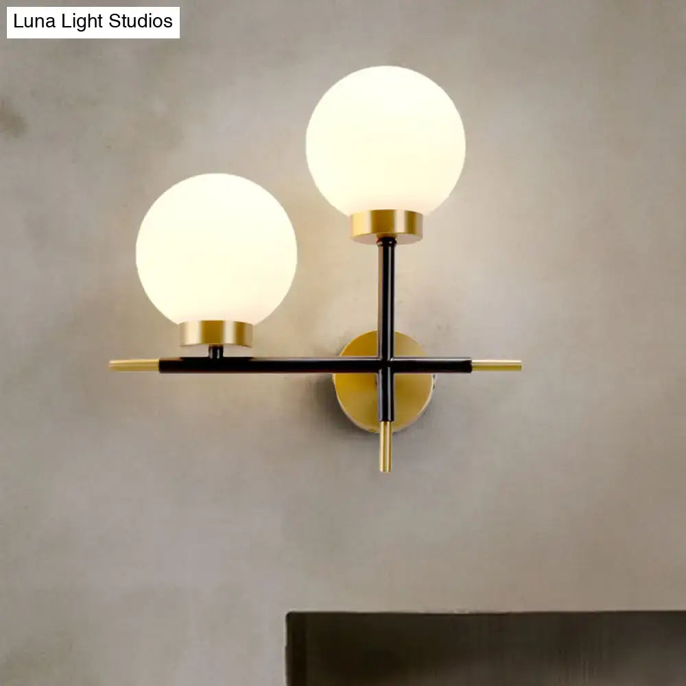 Post-modern white and brass sphere wall sconce bedroom light