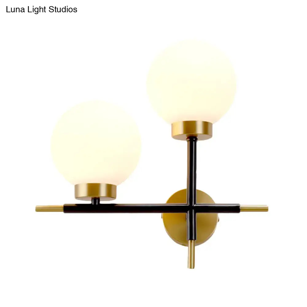 Post-modern white and brass sphere wall sconce bedroom light