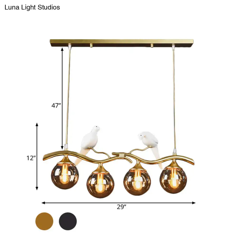 DecorBites™ Postmodern Iron Pendant Light with 4-Lights, Black/Gold Finish, Amber Ball Glass Shade, Bird Deco - Sprig Island