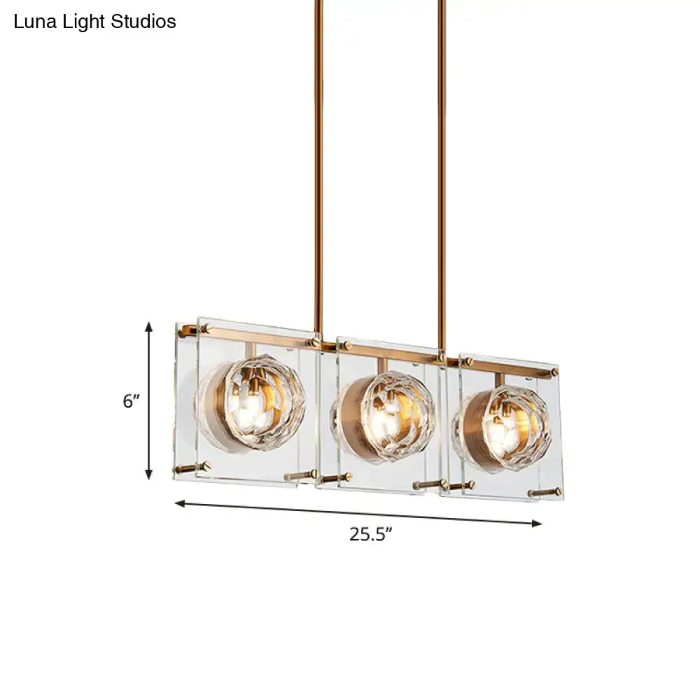 Postmodern gold and clear glass 3-light kitchen island light