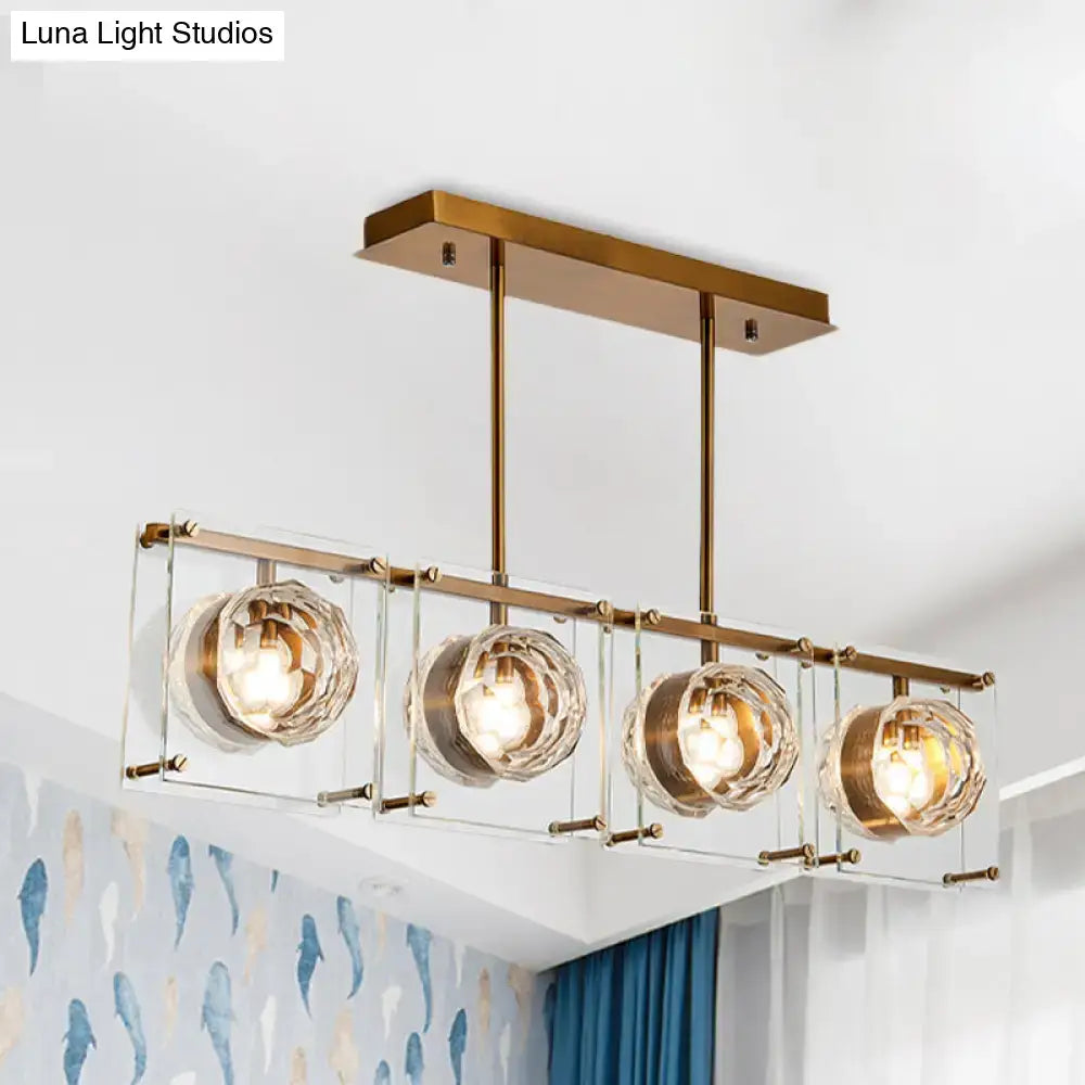 Postmodern gold and clear glass 3-light kitchen island light