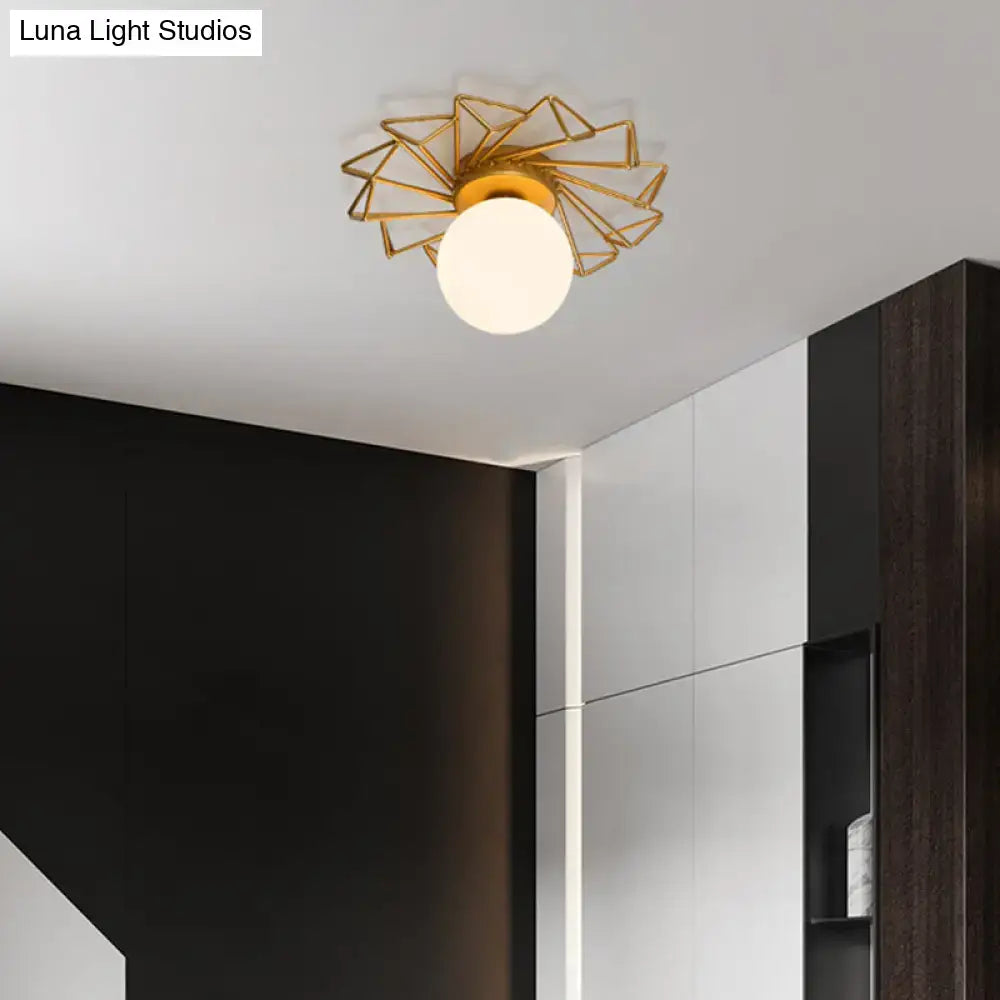 Postmodern gold sunburst ceiling light with cream glass shade bedroom