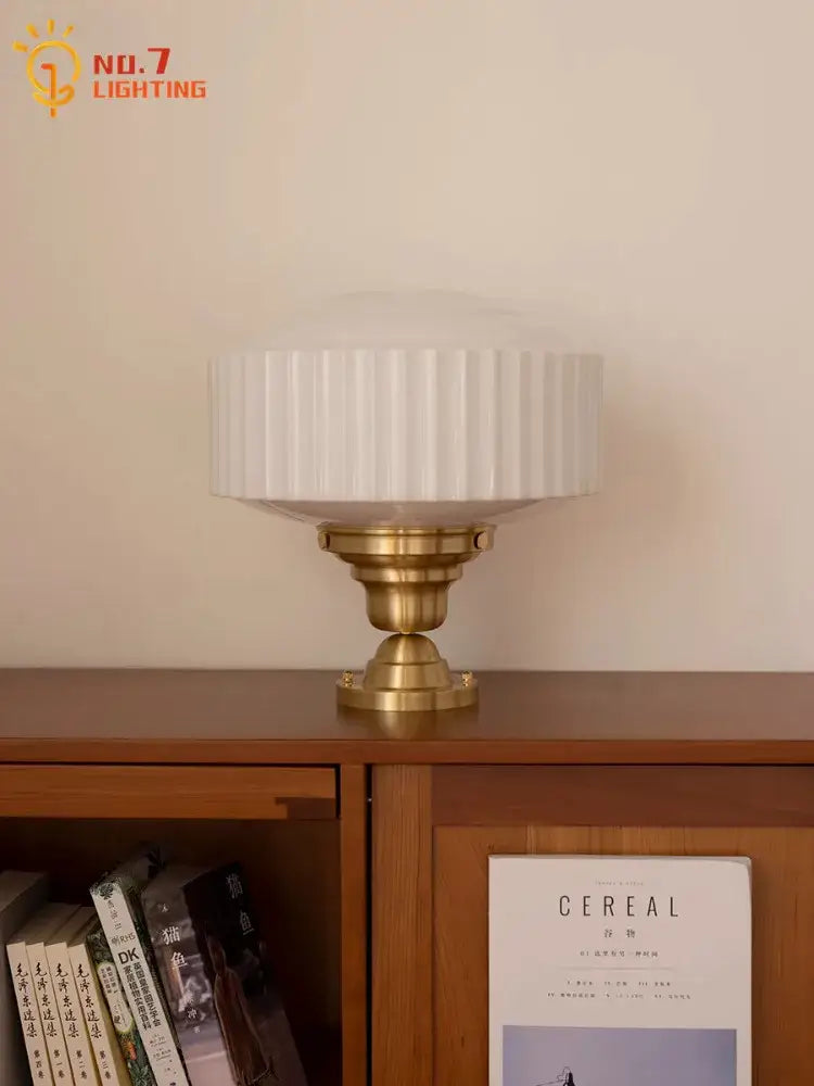 Ribbed cream glass and brass pendant light for dining room