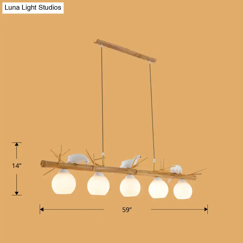 DecorBites™ Modern Cream Glass Wood Pendant Light with White Bird Deco - Dome Island Fixture