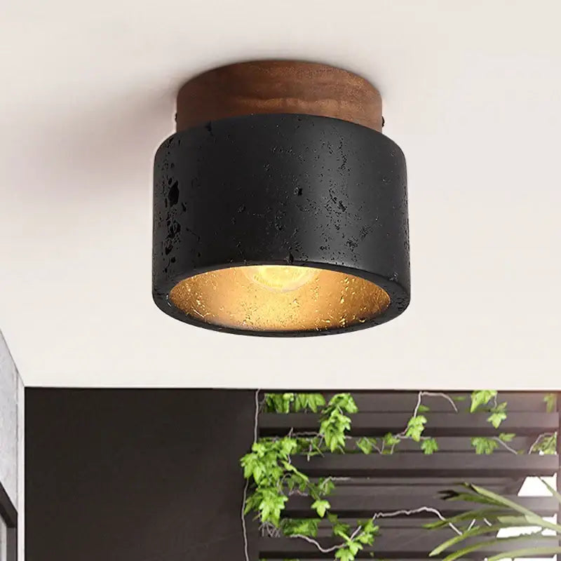 Rustic black travertine ceiling light for entrance hallway