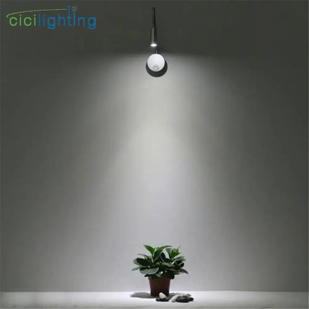Silver flexible gooseneck led wall sconce for bedroom reading
