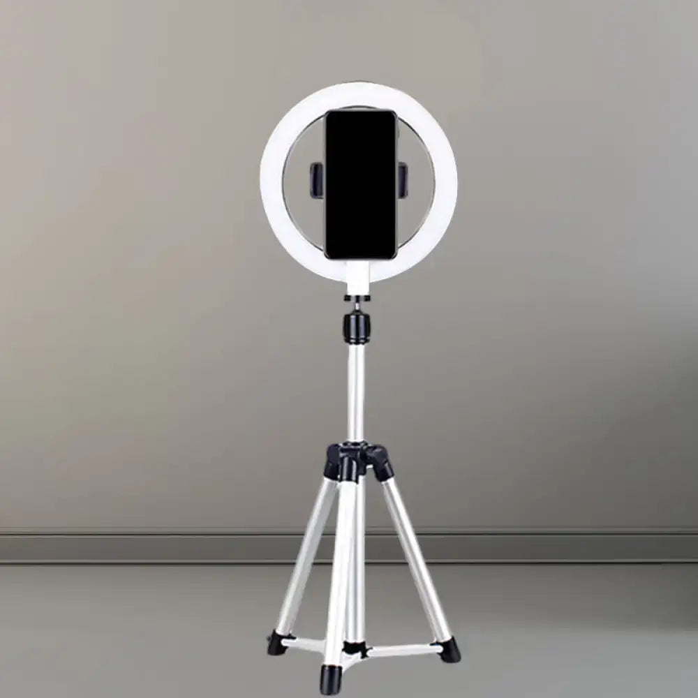 Sleek silver and white circular fill-in lamp bedroom phone holder