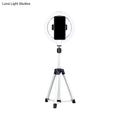 Sleek silver and white circular fill-in lamp bedroom phone holder