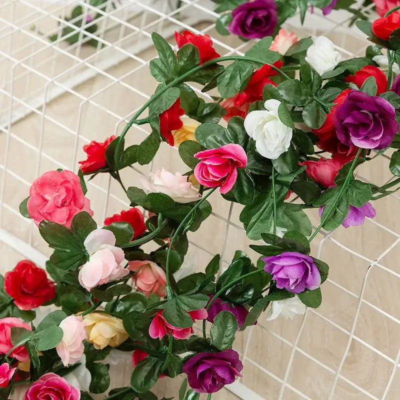 Vibrant multi colored rose flowers vine garland living room decor