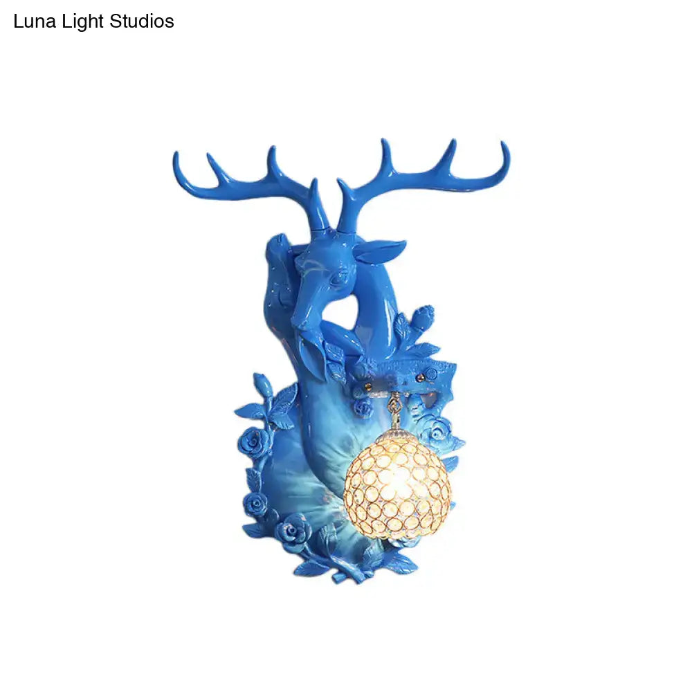 DecorBites™ Loft Style Wall Mounted Sconce with Clear Crystal Shade, Blue/Gold Finish and Deer Head Accent