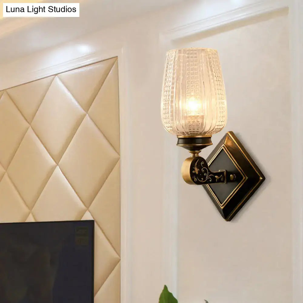 Vintage brass sconce with clear textured glass – living room light