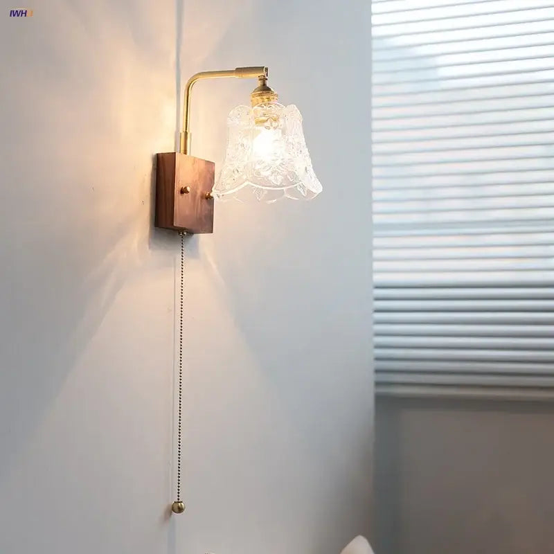 Vintage brass wall light with etched clear glass bedroom sconce