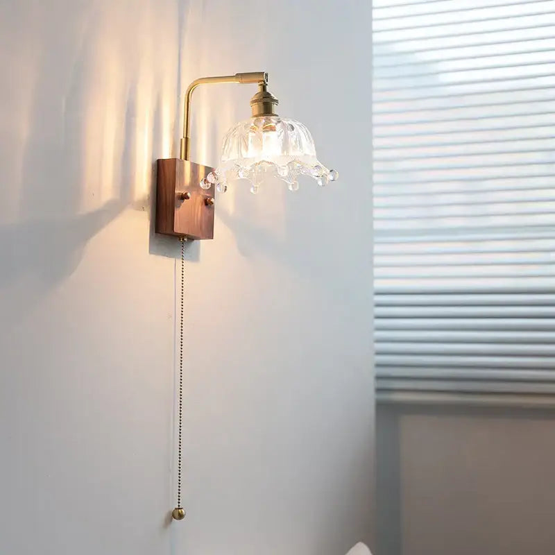 Vintage brass wall light with etched clear glass bedroom sconce