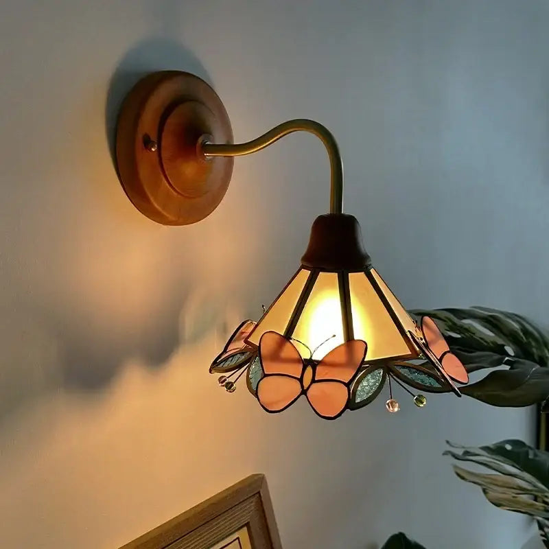 DecorBites™ Butterfly Glass LED Wall Light with Copper Arm for Home Decor.