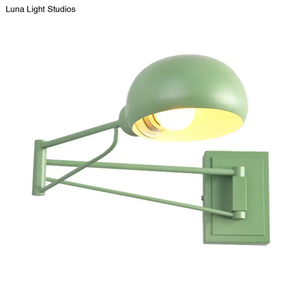 Yellow adjustable metal wall sconce with bowl shade for bedroom
