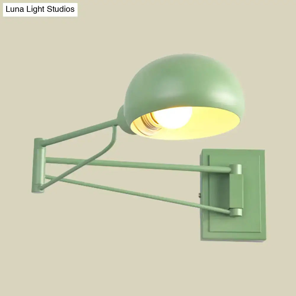 Yellow adjustable metal wall sconce with bowl shade for bedroom