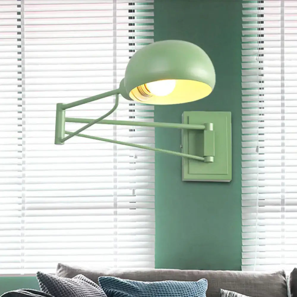 Yellow adjustable metal wall sconce with bowl shade for bedroom
