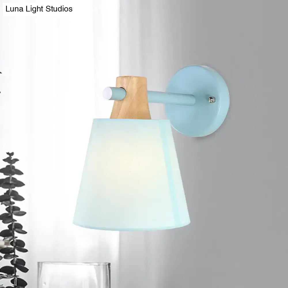 Yellow macaron fabric wall light with wood accent bedroom sconce